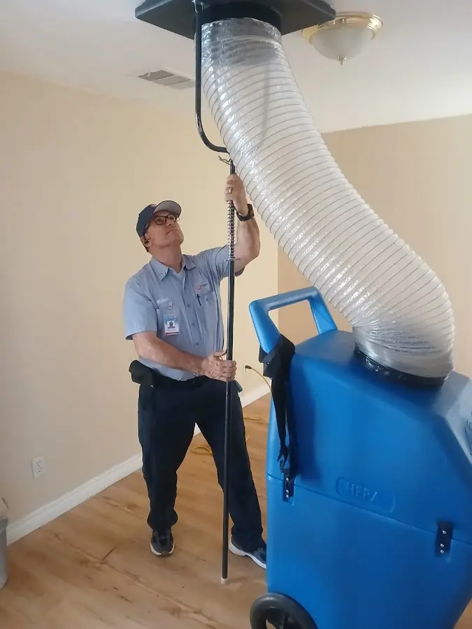 Mini Split Installation technician using HEPA equipment in Huntington Beach